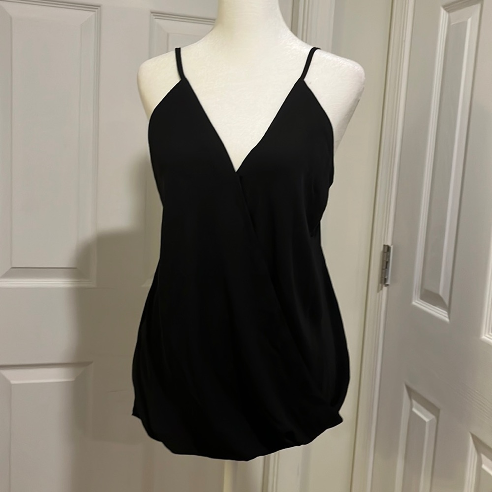 NWOT Strapy sexy, V-neck blouse, from Bloomy’s Size M.